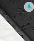 Close-up of Heavy Duty Outdoor Grill Cover For Backyard BBQ Equipment, waterproof material with water droplets, sleek black color.