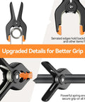Close-up of Six Pack Heavy Duty 4.5 Inch Plastic Spring Clamps for Backdrops and Photography Studios showing serrated edges and grip
