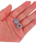 Hand holding 100 Pcs Plastic Screw Caps Protection End Caps Invisible Screw Covers for Home Office Industrial Use Decorative Design.