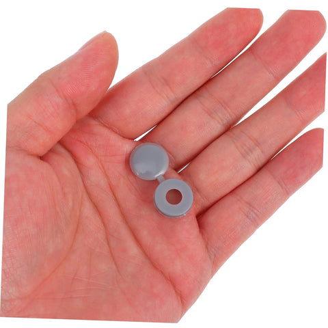 Hand holding 100 Pcs Plastic Screw Caps Protection End Caps Invisible Screw Covers for Home Office Industrial Use Decorative Design.