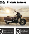 Rugged Kickstand Plate Pad For Heavy Cruiser Motorcycles, Universal Floor Protector Keeps Your Ride Upright On Grass, Dirt, Gravel, And Hot Pavement, Prevents Sinking With A Big Non Slip Base underneath a parked cruiser motorcycle on a wooden deck with scenic background.