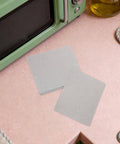 Mica Insulation Sheet 10 Pack For Microwave And Oven Repair Heat Resistant Fireproof Dielectric Board on kitchen counter