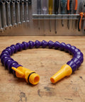 Flexible Coolant Hose With Half Inch Thread And Flat Nozzle Switch, Adjustable Water Pipe For Lathes, Mills And Hydraulic Cooling Systems, About Twenty Three Point Six Inch Length on a workbench