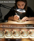 Person using 10X Magnifying Glass With Light And Stand For Close Work, 4.3-Inch Distortion-Free Lens for detailed craftsmanship.