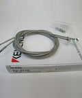 Keyence FU-77TG Transmissive Fiber Optic Sensor Switch Unit, coiled cable on packaging box, plug-and-play design for PLC