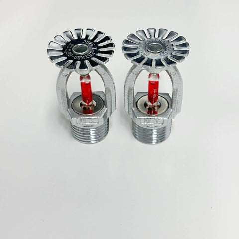 Two Rock Solid Pendent Fire Sprinkler Heads With Chrome Plated Copper Body 1/2 Inch Npt Thread on white background.