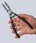 Hand holding Pro-Grade 4-Piece High Leverage Snap Ring Pliers Set tool, 7-inch with spring-loaded handles, chrome vanadium steel.