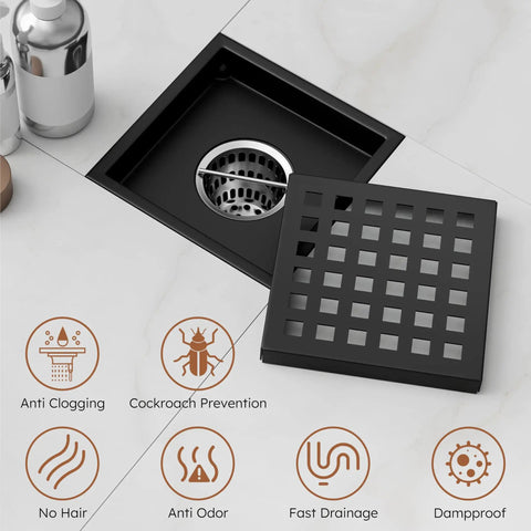No Drama Matte Black 4 Inch Square Shower Drain Kit With Removable Grate on tiled floor with stainless steel catch basin.