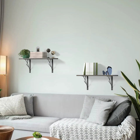 Living room with Black 8 Inch Heavy Duty Floating Shelf Brackets Set of 4 with Rustic Tree Branch Design holding books and decor