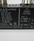 Close-up view of 24V AC contactor with specifications showing 30A rating for heavy-duty industrial use.