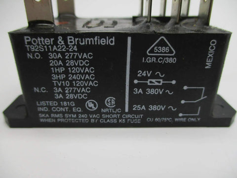 Close-up view of 24V AC contactor with specifications showing 30A rating for heavy-duty industrial use.