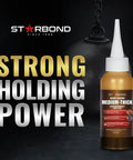 Premium Dark Brown Super Glue 2 Oz Medium Thick Cyanoacrylate Adhesive For Woodworking Woodturning Carpentry Guitar Build RC Hobby Knot Filler With Badass Quick Set Grip in a dark environment.