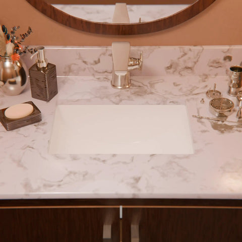 Rectangular Undermount White Porcelain Sink With Matte Black Drain Set And Overflow Pop Up Drain Sealer Included For Easy Install 1.75 Inch Drain Opening Inside Dimensions 11.5 By 16.25 By 6.5 Inches on marble countertop