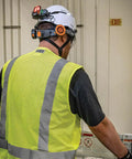 Worker wearing hard hat with dual cooling fan for hard hats and safety helmets, lightweight USB C rechargeable head neck cooler