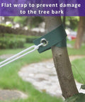 Green tree strap securing young tree with rope, part of All In One Steel Tree Stake Kit For Young Trees, Heavy Duty Tree Supports.
