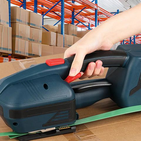 Heavy Duty Electric Hand Strapping Machine For Half To Five Eighth Inch PP PET Straps Friction Seamer Cartoning in use on cardboard.