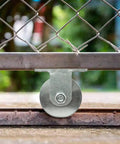 Knockout 4 Inch Galvanized Steel V Groove Gate Wheel With Welded Bracket Handles 3000 Pounds Loaded Down Hard With Premium Sealed Bearings to roll heavy barn doors.