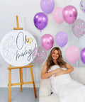 Sixty Eight Piece Pink And Purple Balloons Set 12 Inch Metallic Latex Party Decor With Ribbon Ties For Weddings Birthdays And Baby Showers Goes Hard Absolute Party Atmosphere Booster with woman and sign.