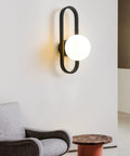 Fresh Modern Glass Wall Sconce Lighting For Bedroom And Living Room Indoors Or Outdoors Creative Nordic Style Reading Lamp With Bright Led Bulbs For Dope Home Decor And Total Glow Up Night Vibes Tonight mounted on a clean wall next to a cozy armchair.