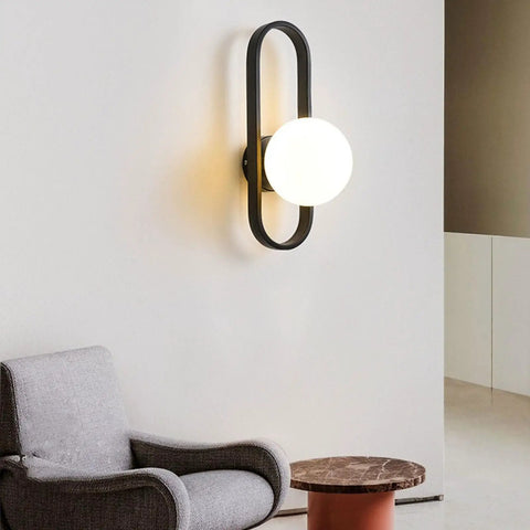 Fresh Modern Glass Wall Sconce Lighting For Bedroom And Living Room Indoors Or Outdoors Creative Nordic Style Reading Lamp With Bright Led Bulbs For Dope Home Decor And Total Glow Up Night Vibes Tonight mounted on a clean wall next to a cozy armchair.