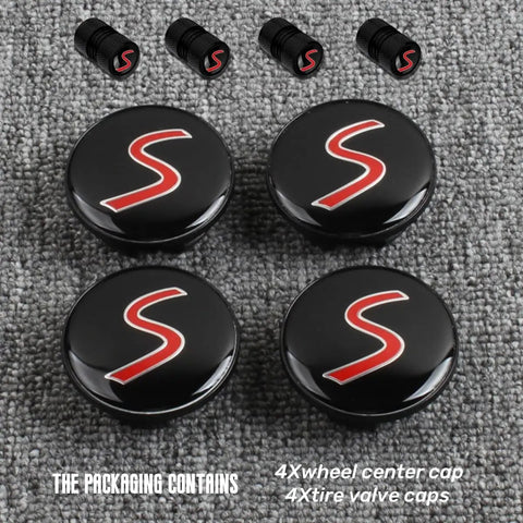 54mm S Logo Wheel Center Cap Set For Mini Cooper Clubman Countryman Paceman Premium ABS Material Durable Wheel Center Covers With A Sleek Chrome Finish Easy To Install So You Can Deck Out Your Rims Fast. Image of four black wheel center caps and valve stem covers with red S logo on gray background.