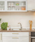 Modern kitchen with Gold Brushed Brass Cabinet Pulls With Handy Screwdriver, 9 1/4 Inch Overall Length, 8 4/5 Inch Hole Center