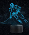 Hockey Player 3D Night Lamp With 7 LED Color Changing Lights on black base, blue hockey player illusion in starry background.
