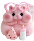 Totally Sweet Handmade Squishy Hamster Toy For Chill Out Vibes, pink silicone fidget toy with glasses, cheese, and bottle.
