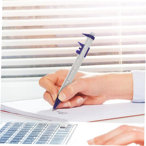 Person writing with caliper ballpoint pen from Science Party Stationery Gift Set With 12 Sticky Notes 12 Ballpoint Pens And 50 Science Stickers