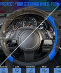 Slick Microfiber Leather Steering Wheel Cover Universal 14.5 To 15 Inch on a steering wheel, showing protection from cold and sun.