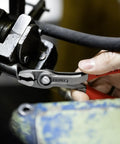TwinGrip Pliers 6 Inch With Front And Side Gripping For Stripped Screws Front Jaw Grips Tough Fasteners in use on round material