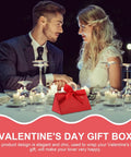 Valentine Day Candy Boxes With Handles Pack Of 20 Portable Paper Wrapping Boxes For Showers And Birthday Parties on a candlelit table