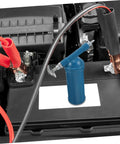 Portable 80cc Grease Gun With Precision Nozzle For Excavators, Cars, And Industrial Equipment shown on engine