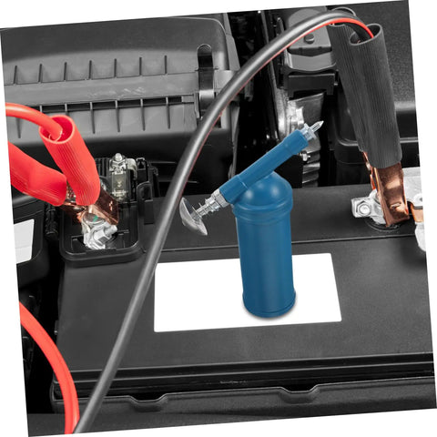 Portable 80cc Grease Gun With Precision Nozzle For Excavators, Cars, And Industrial Equipment shown on engine