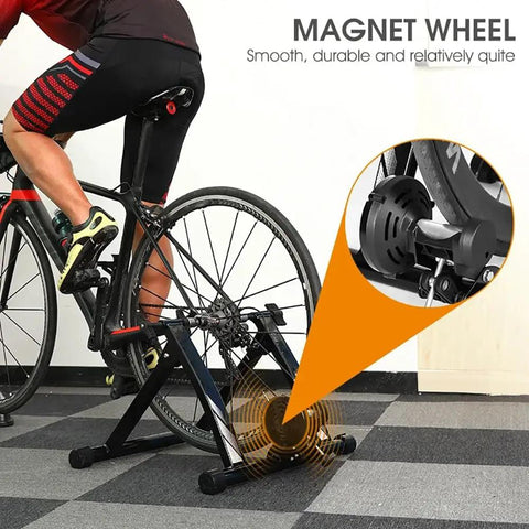 Indoor Bike Trainer With Magnetic Resistance Foldable Portable Turbo Trainer Stand in use with road bike, magnet detail.