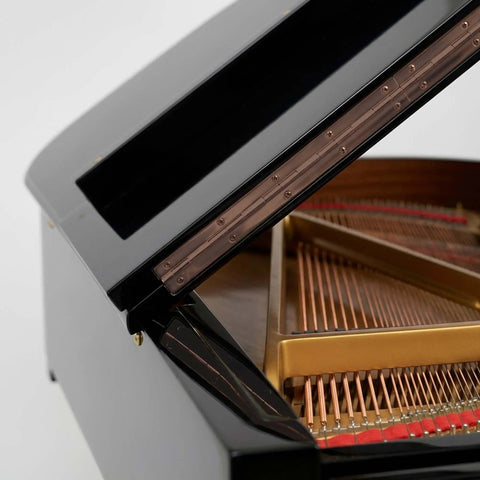 Built Different Statuary Bronze Plated Piano Hinge Measuring One Point Five Inches Wide By Thirty Six Inches Long With Dense Steel Core and Smooth Continuous Swing For Restoration Builds on a piano lid.