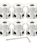 Upgrade Your 3D Printer With This Sweet Kit Of Six Gt2 Timing Belt Pulleys Featuring A Solid Aluminum Build And 20 Teeth Designed To Stop Slipping And Boost Power Transfer For Super Smooth Printing Plus Comes With A Hex Wrench For Easy Install; six aluminum GT2 pulleys and hex wrench