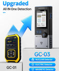 FNIRSI GC-03 Geiger Counter handheld detector, black/silver with blue control dial; GC-01 yellow unit also shown