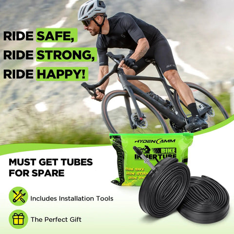 Cyclist riding with Two Pack 700c Road Bike Inner Tubes 700x20c To 700x25c With 42mm Presta Valve Butyl Rubber Includes Two Tire Levers