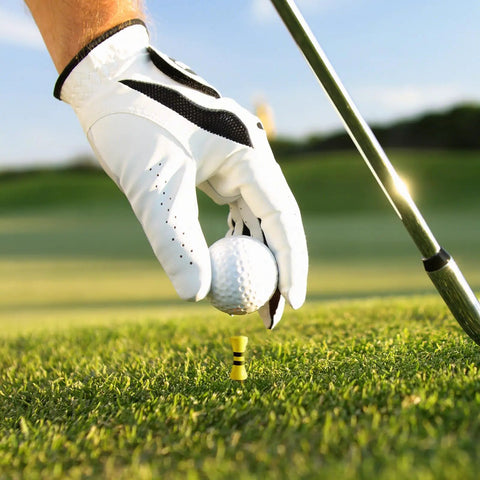 Golf ball placed on Wood Castle Golf Tees Set Mixed Colors, Step Down Training Tees for consistent shot height