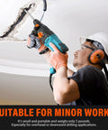 Worker using One Inch SDS Plus Rotary Hammer Drill With Safety Clutch 7 Amp Corded 4 Function Variable Speed on ceiling