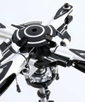 Close-up of T Rex 600 DFC 4 Blade Flybarless Rotor Head Kit for Trex 600 RC Helicopter, CNC machined alloy parts, top view.