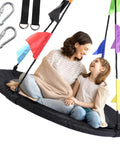 40 Inch Saucer Tree Swing For Kids With Heavy Duty Steel Frame Foam Padding Braided Ropes And Secure Metal Rings Easy Setup Outdoor Round Swing With Adjustable Straps For Super Sturdy Backyard Fun For The Whole Crew featuring a mother and child