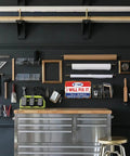 Funny Metal Garage Sign For Men Tin Sign Man Cave Decor Reads If I Say I Will Fix It There's No Need To Remind Me Every Six Months 8 By 12 Inch Wall Art For Shop Garage And Workshop on a workshop wall above a tool cabinet.