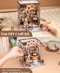 Sunny Cafe Book Nook Kit DIY Cozy Miniature House for adults and teens with LED light displayed on table