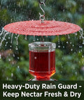 Two Pack 11.5 Inch Metal Bird Feeder Rain Guard With Red Umbrella Dome Shield Weather Baffles shielding a hanging bird feeder