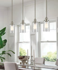 Dining room with modern fixtures featuring Brentwood Seeded Glass Shades Set, Clear Bubble Glass, 6.25 Inch By 4 Inch Dimensions, 3-Pack