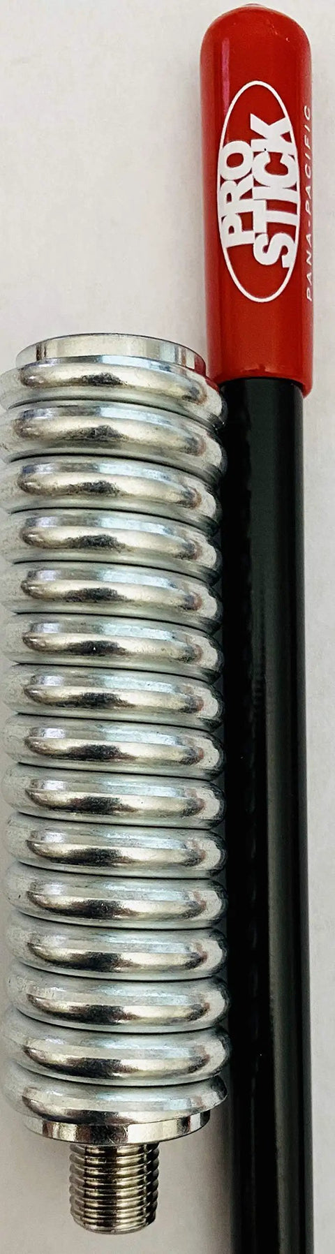 Close-up of 2 Foot Fiberglass CB Radio Antenna With 1000 Watt Rating Black Finish Heavy Duty Stainless Steel Spring VibraSorb Design