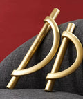 Brushed Gold Half Moon Cabinet Pulls Set of 2, 3.75 Inch Length, sleek zinc alloy handles on a grey fabric background