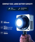 RGBWW LED Video Light With 72Wh Battery And 100W PD Fast Charging shown handheld spotlighting compact size and battery capacity.